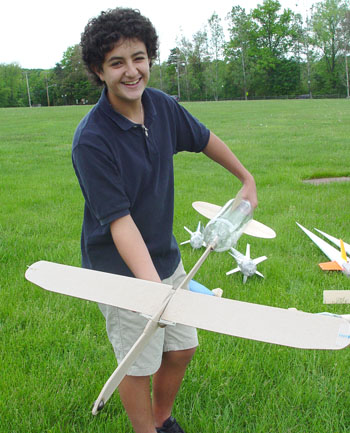 Chris Erler and his Sewickley Academy's sixth grade Earth Science class folding wing rocket plane